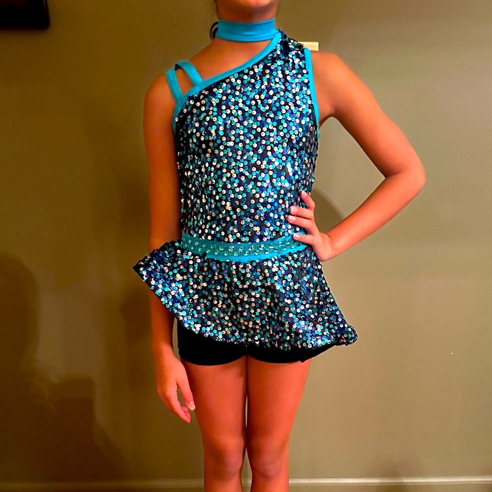 Beautiful asymmetrical dance costume, full of sequins! Undershorts attached.